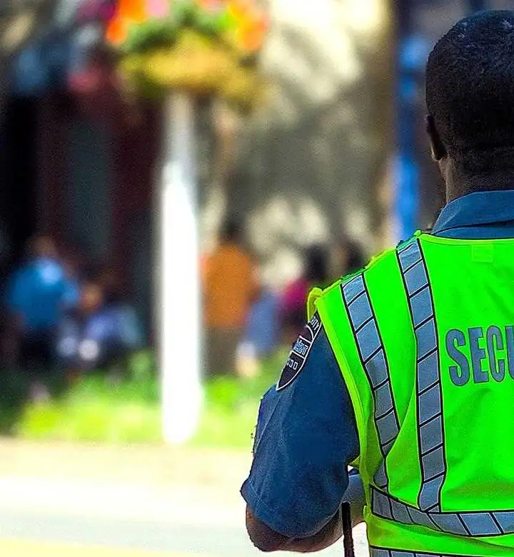 Security Guard Patrolling City Park