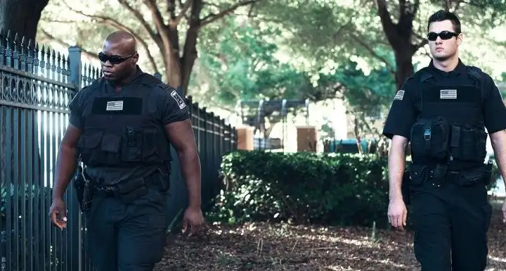 Security Officers doing a patrol round in a park