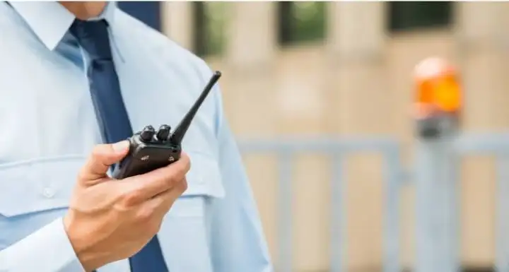 security guard with walkie talkie